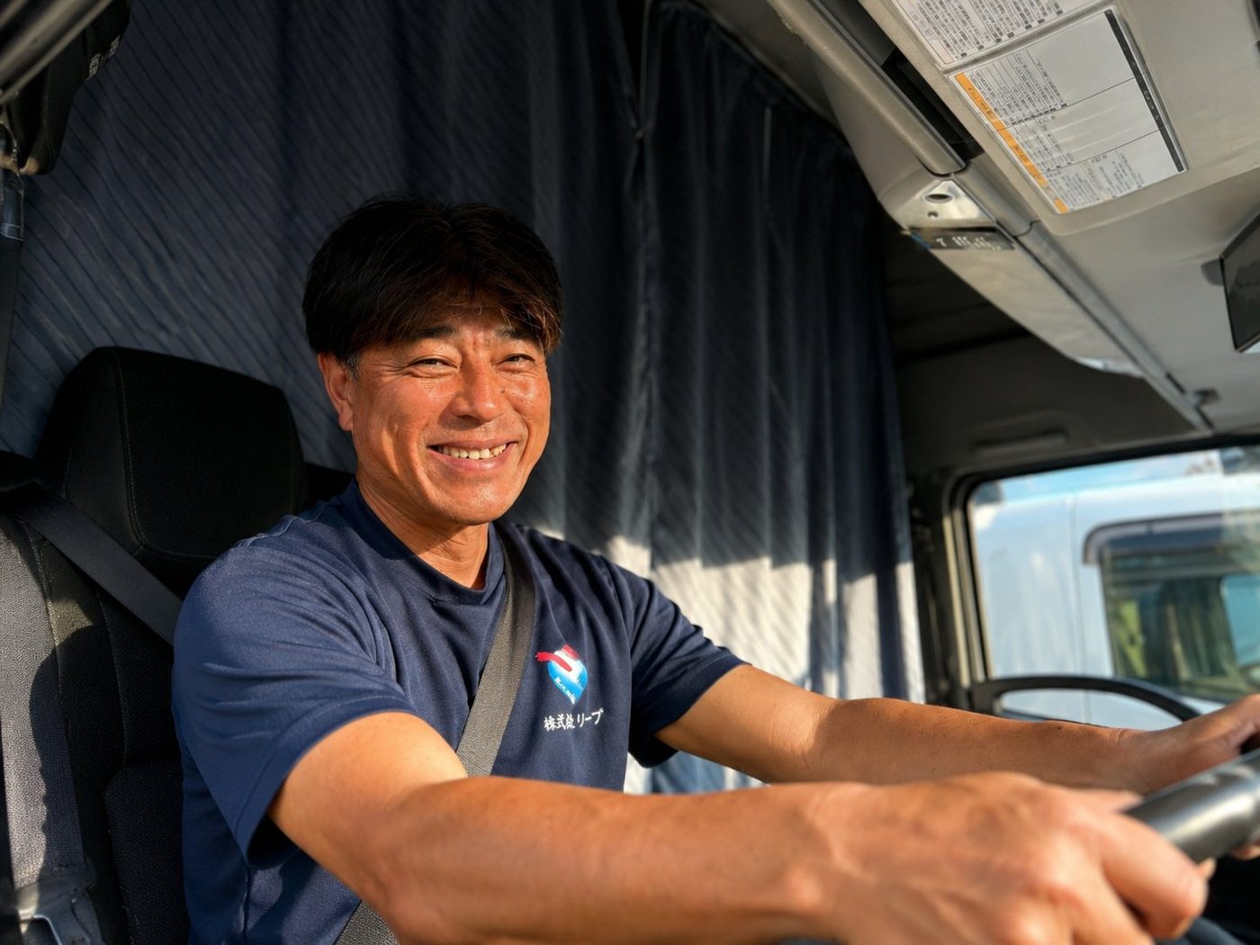 運転席のドライバー